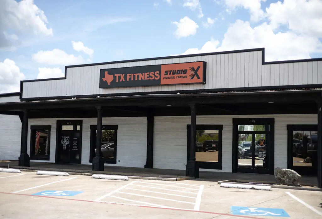 TX Fitness gym building exterior on Highway 80 in Forney Texas