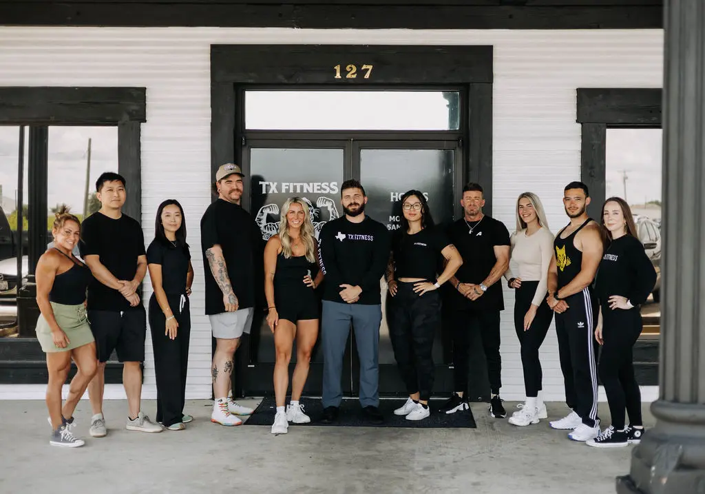 The TX Fitness team standing in front of the gym in Forney Texas